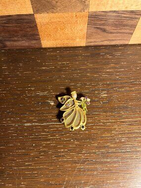 Gold Toned Angel Brooch with Floral Bouquet